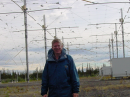 Antenna designer Jim Breakall, WA3FET, stands in the HAARP antenna field in Alaska. [Courtesy of Jim Breakall, WA3FET]